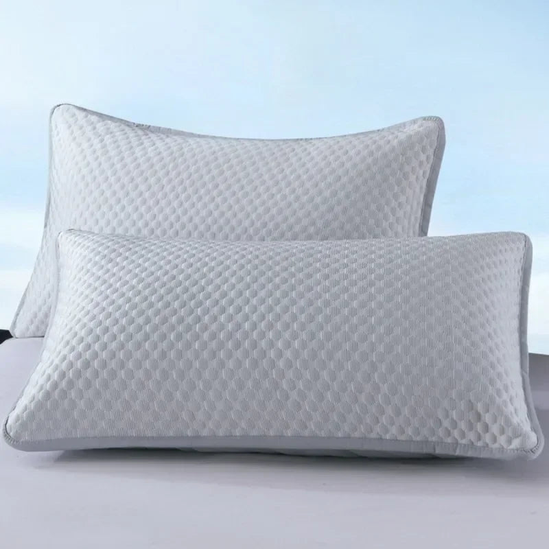 Two Ice Silk Cooling Pillow Covers in grey, stacked on top of each other.